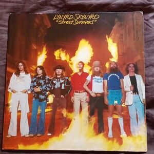 Lynyrd Skynyrd Street Survivors vintage original 1977 album & 2 inserts.